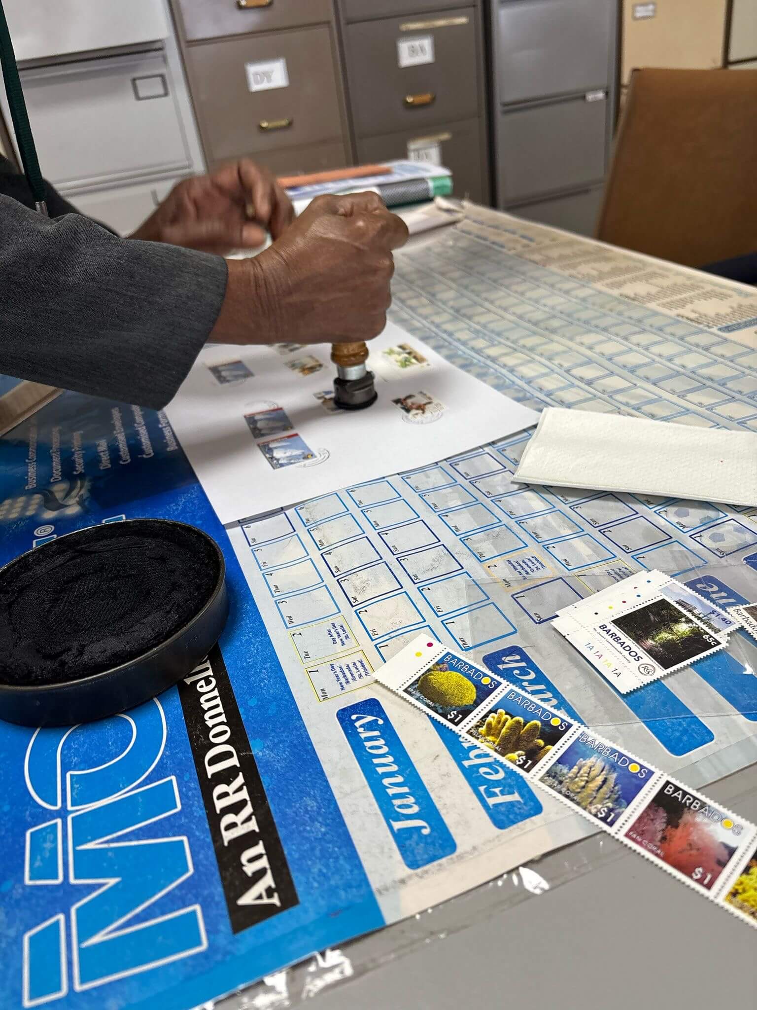 Cancelling stamps in the Barbados Philatelic bureau