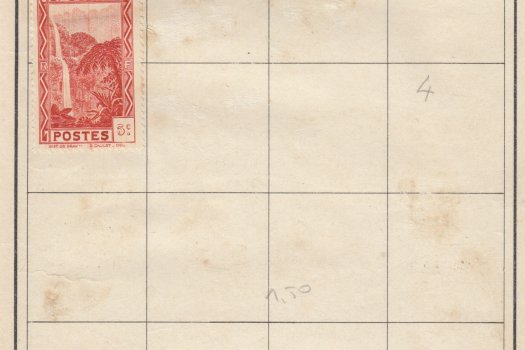 A page of low value stamps from Reunion, with many others obviously removed from the page